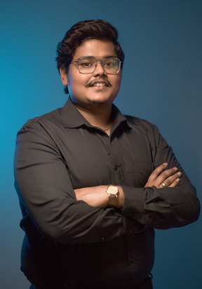 Prasanth jeyakumar, founder of bluestrategy is posing confidently for the business potrait.